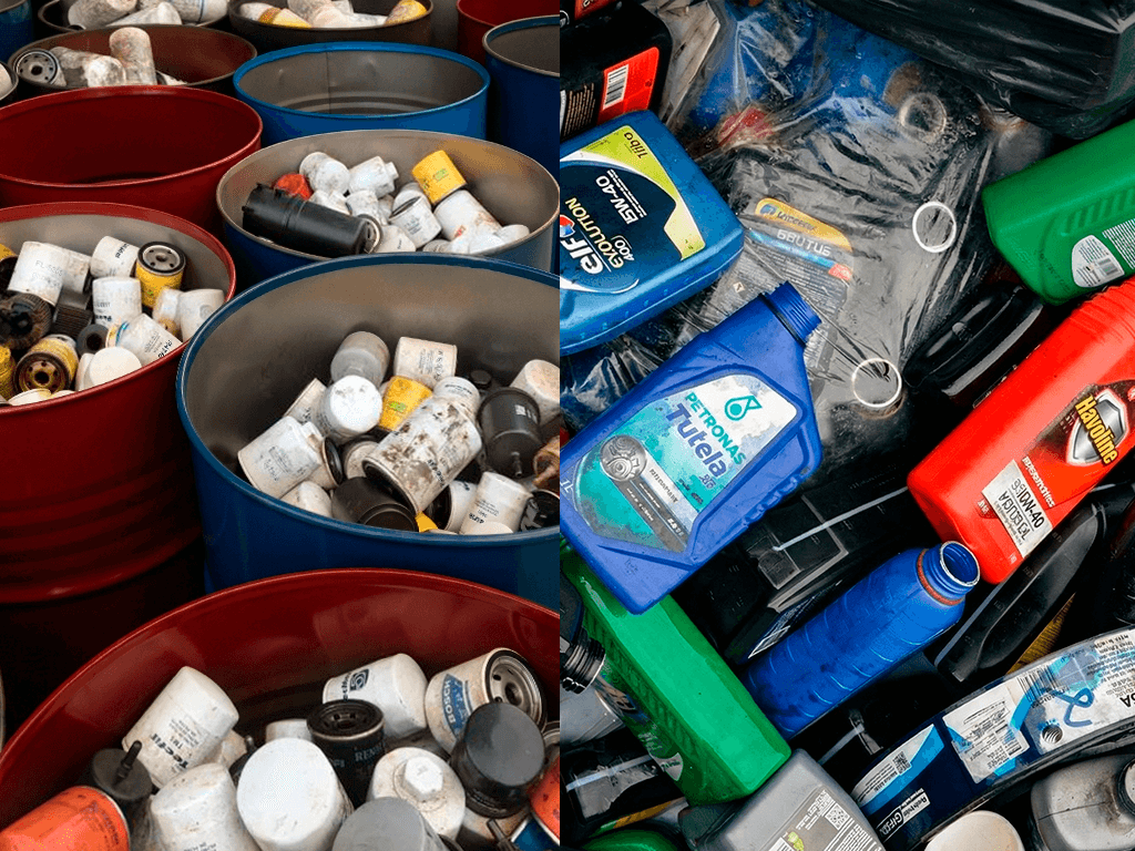 Pilhas de recipientes de óleo usado
